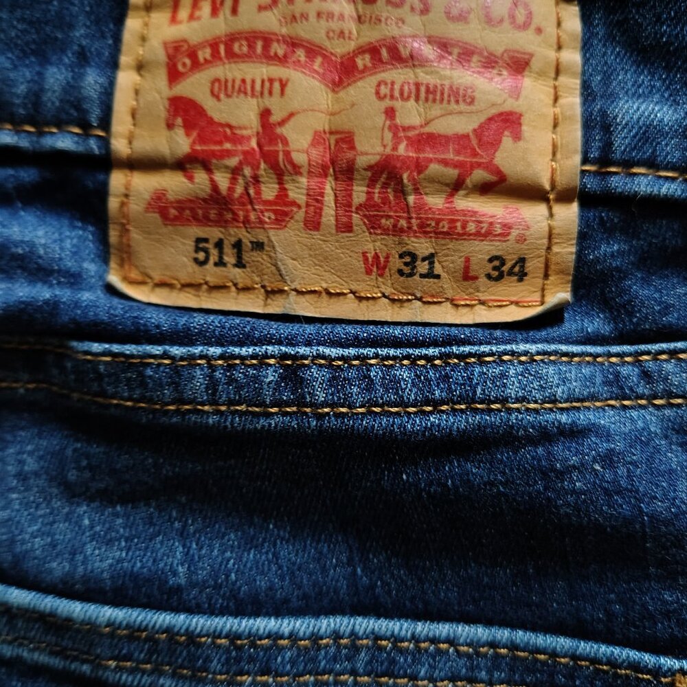 Preowned Mens Levis 511 strait leg whiskered blue jeans size 31x34